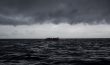 A dinghy sails at Mar de Alboran between Spain and Morocco.