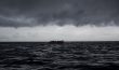 A dinghy sails at Mar de Alboran between Spain and Morocco.